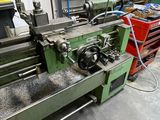 a machine that is sitting in a room with other machines