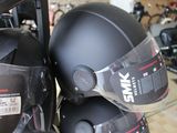 two helmets that are on top of each other