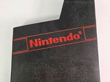 a close up of a nintendo game console box on a white surface