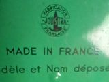 a sign on the side of a green container that says made in france