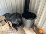 a trash can and a trash can in a storage container