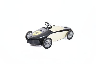 black and white toy car with batman symbol on the front