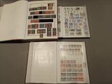 a lot of stamps in a book on a table