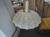 a lamp that is sitting on a table in a room