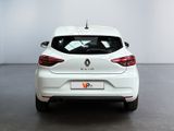 the rear end of a white car in a white room