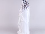 a white statue of a woman with a crown on it ' s head