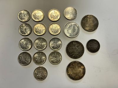 a close up of a bunch of coins sitting on top of a table