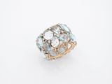 a close up of a ring on a white surface