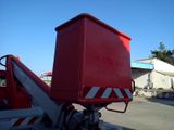 a large red box sitting on top of a truck