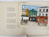 a picture of a book with a picture of a town on it