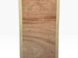 a close up of a piece of wood with a drawing on it