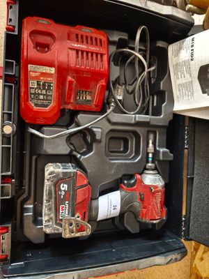 a tool box with tools in it on a table