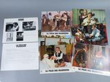 several pictures of a bunch of old movie posters on a table