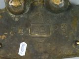 a close up of a metal object with a tag on it