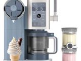 an ice cream maker with a scoop of ice cream in front of it