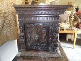 a very large wooden table with a carving on it