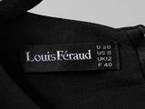 a close up of a louis ferraud label on a black jacket