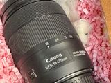 a camera lens sitting in a box on a table