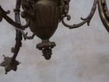 a chandelier hanging from the ceiling in a room