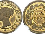 une pièce d'or ornée d'une tête de femme et de lauriers