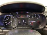 a close up of a car dashboard with a speedometer and gauges