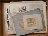 a box full of old books and papers in it