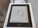 a small electronic device in a box on a table