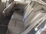 the back seats of a car in a car showroom