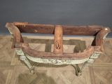 a wooden bench that is sitting on a parquet floor