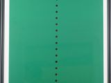 a green poster with black dots on it in a black frame