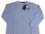 a blue sweater with a black tag on it