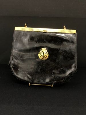 DUC : Sac à main en cuir verni noir, fermoir à tige en métal… - Photo 1