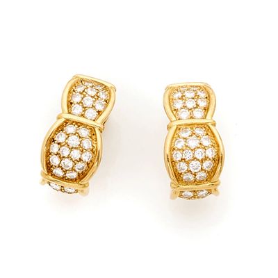 a pair of diamond and eighteen karat gold earrings
