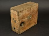 a wooden box with a lock on it on a black background