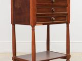 an image of a small wooden table with a drawer on top of it