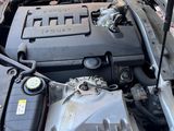 the engine of a car with its hood open and the hood open