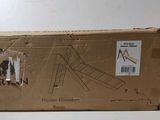 a cardboard box that has a picture of a man on a swing
