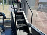 a treadmill and a tread machine in a gym