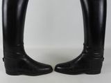 pair of black leather riding boots with wooden heel on white background