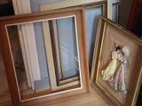 a picture of a doll in a picture frame next to a picture of a doll
