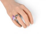 an image of a woman ' s hand with a ring on it ' s finger