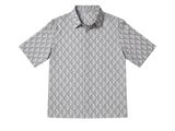 a grey and white shirt with a pattern on the collar