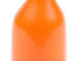an orange vase sitting on top of a white table next to a white wall