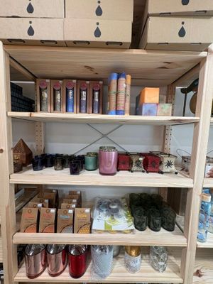 a wooden shelf with many different items on it