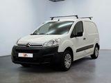 the white van is parked in a white room with a black roof rack