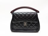 chanel black quilted leather handbag with wooden handle