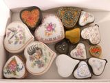 a box filled with heart shaped cookies and decorated cookies