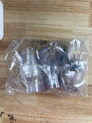 a plastic bag with a couple of bottles inside of it