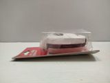 a roll of toilet paper wrapped in a plastic wrapper