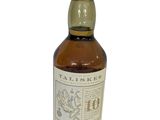 an image of a bottle of whisky on a white background